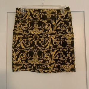 Paisley like yellow and gray mini skirt